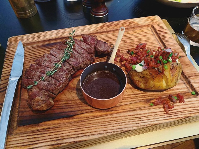 Delicious beef-steak served